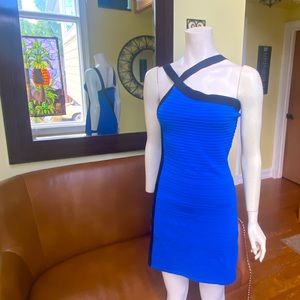 Spandex 💙 🖤 hot blue dress with black accent. Size large. Super fun